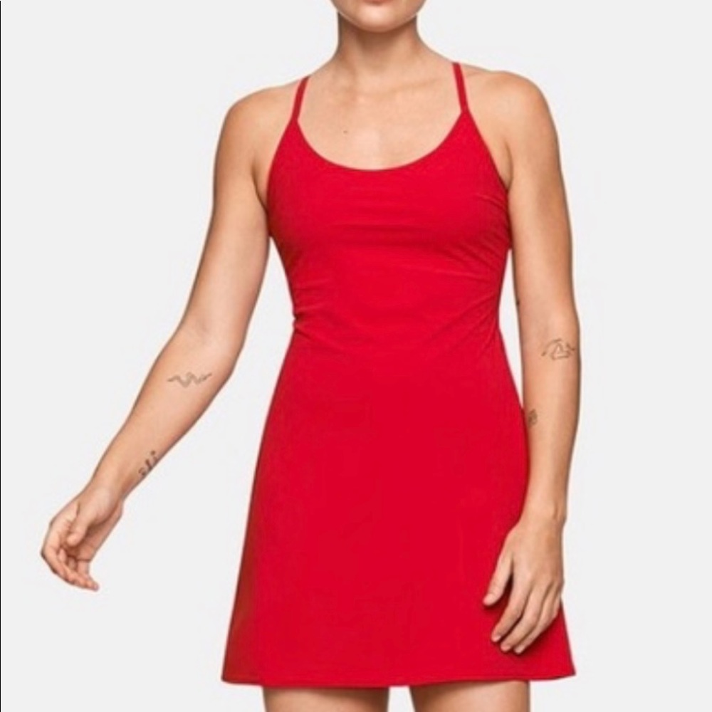 Small, red Outdoor Voices athletic dress.